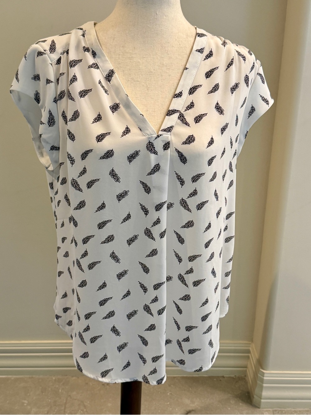 fun 2 fun White V-Neck Blouse with Black Feather Print